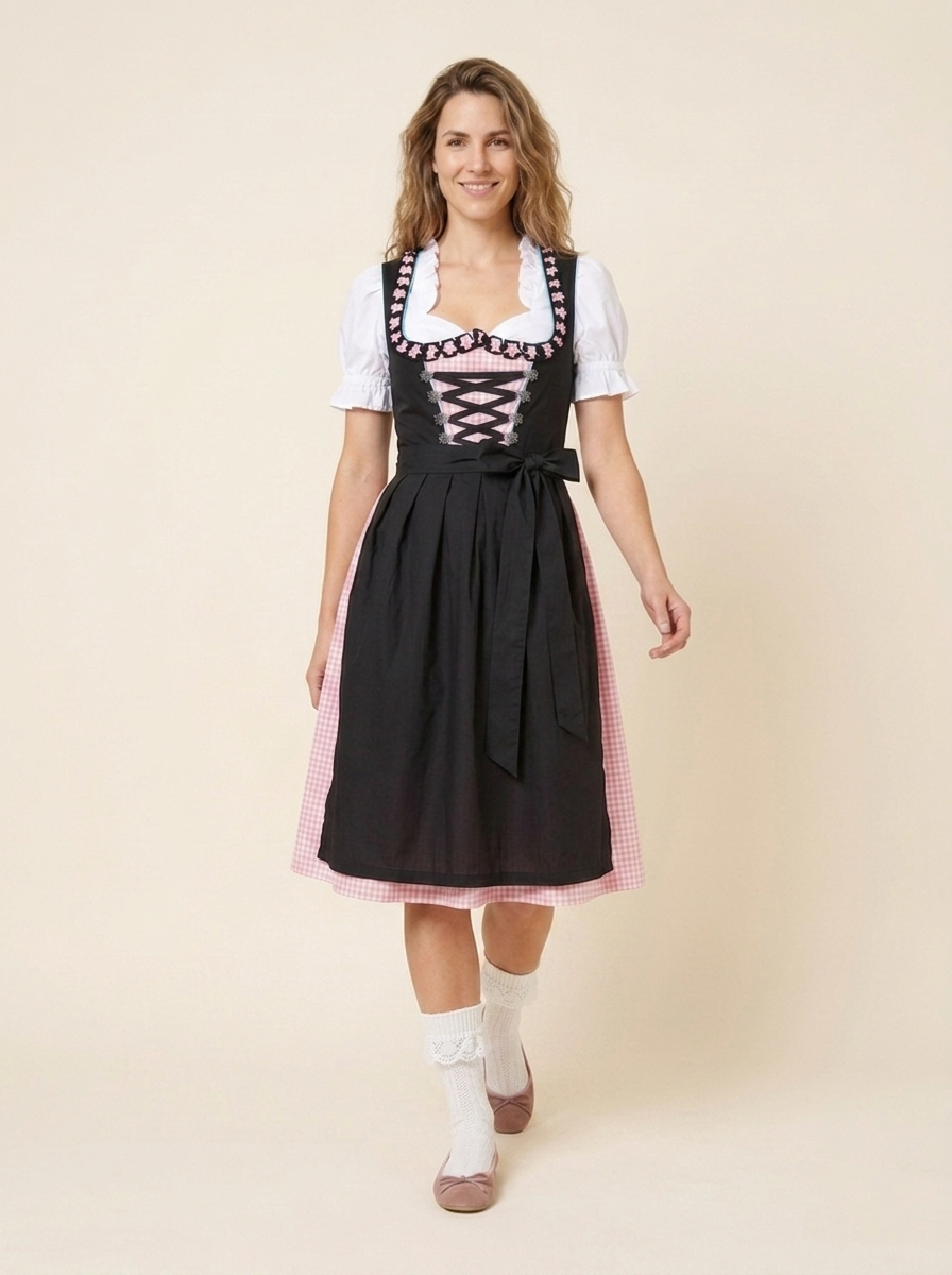 Dirndl Set Anja rosa-schwarz in Bewegung